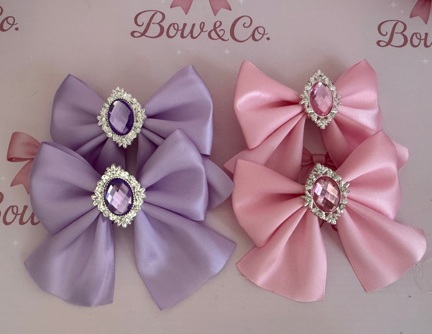 Gem tail bows