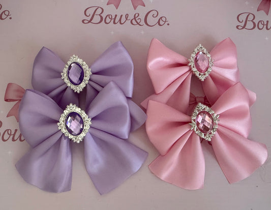 Gem tail bows